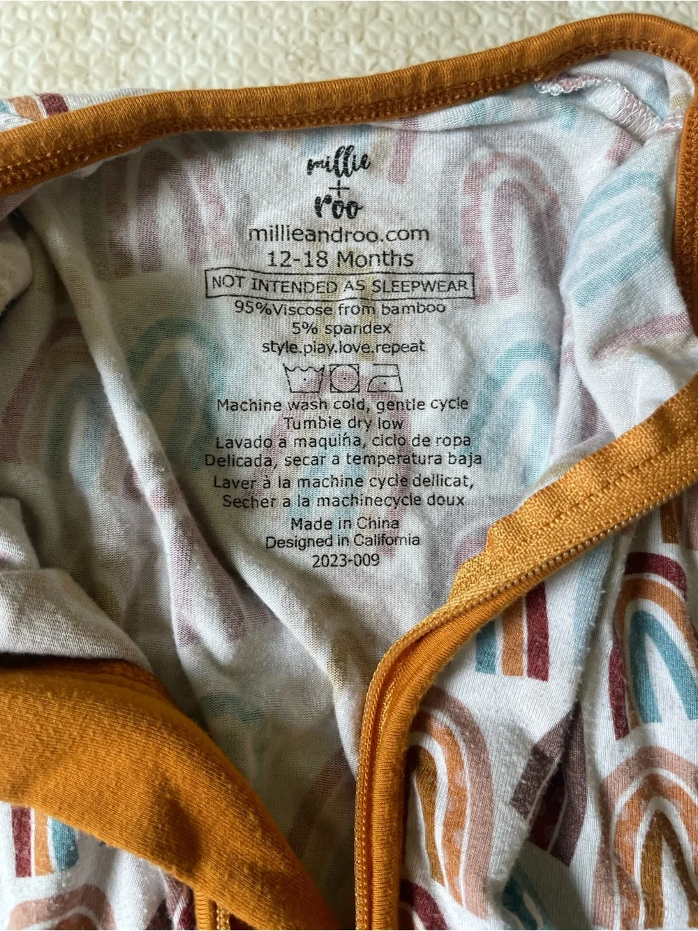Millie and Roo Toddler Rainbow-Print Footed Pajama Set with Rust Trim